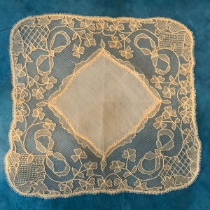 Antique Irish Limerick Lace Handkerchief, the perfect wedding gift, and lace collection. Embroidered with three leaf clovers and bows.