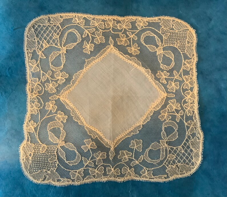 Antique Irish Limerick Lace Handkerchief, the perfect wedding gift, and lace collection. Embroidered with three leaf clovers and bows.