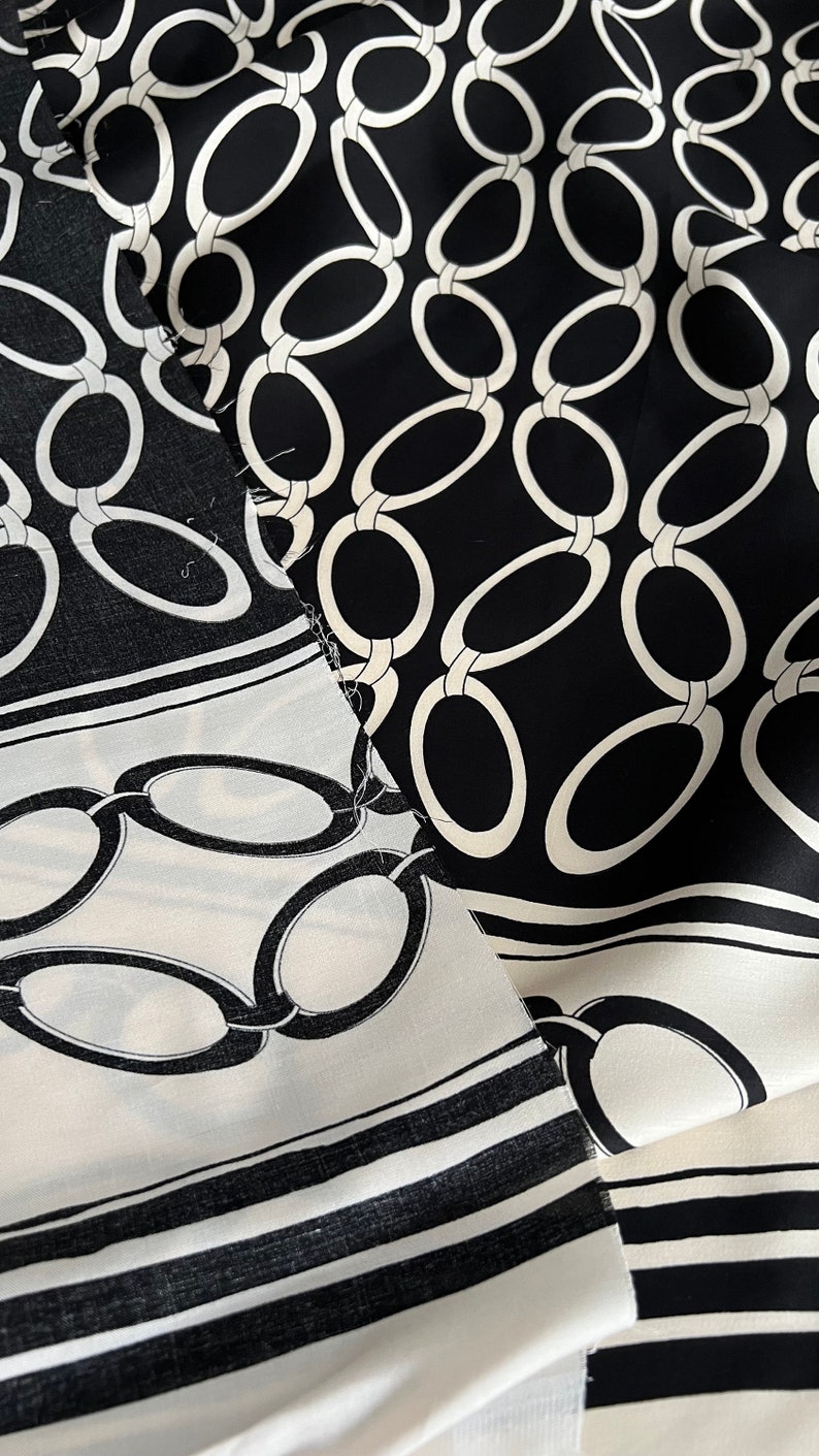 Esclusivo tessuto italiano in viscosa, tessuto di design nel famoso stile del designer, alta qualità, colore: nero-beige, motivo lungo il tessuto immagine 6