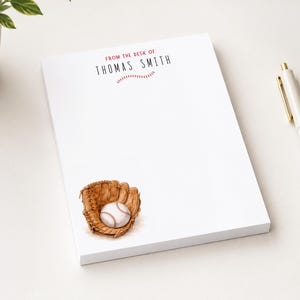May include: A white rectangular notepad featuring the red text FROM THE DESK OF and black text THOMAS SMITH, with a red baseball stitch graphic underneath. A brown leather baseball glove holding a white baseball is printed in the bottom left corner.