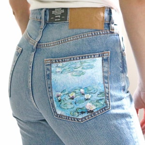 Painted pockets top on jeans