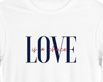 May include: White long-sleeve t-shirt with a navy blue graphic that says "LOVE is a choice" in a bold font.