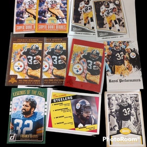 May include: A collection of trading cards featuring Franco Harris, a former American football running back who played for the Pittsburgh Steelers. The cards are from different sets and feature various images of Harris in his Steelers uniform. The cards are in good condition and would be a great addition to any sports card collection.