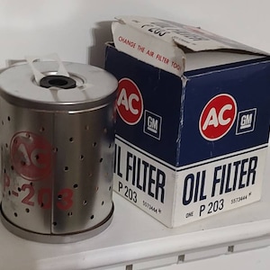 Vintage 1946-56 AC GM Engine Oil filter unused in box 5573444 Ford tractor Mercedes Hudson Avery filter cartridge and box Made in USA