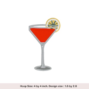 May include: A red martini glass with a lemon wedge garnish. The glass is silver and has a long stem. The lemon wedge is yellow with a green center.