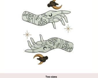 May include: Two embroidery designs featuring stylized hands with floral patterns and crescent moons. The larger design measures 4.8 inches by 6.2 inches and the smaller design measures 2.7 inches by 3.7 inches.