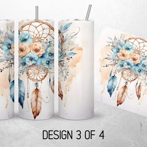May include: A white tumbler with a watercolor design of a dreamcatcher with blue and orange flowers and feathers. The design is on the right side of the tumbler. The tumbler has a straw and is on a white background. "DESIGN 3 OF 4" is written at the bottom of the image.