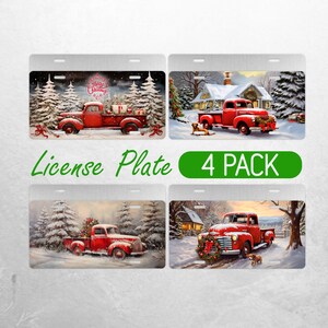 May include: Four red vintage pickup trucks with Christmas decorations are featured on these license plates. The trucks are driving through a snowy winter wonderland. The plates are metal and have a white background.