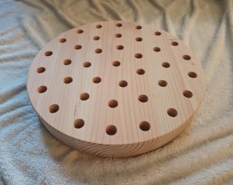 Round wood candle holder rustic decor provides warm natural ambiance perfect for enhancing cozy home interiors and farmhouse style living