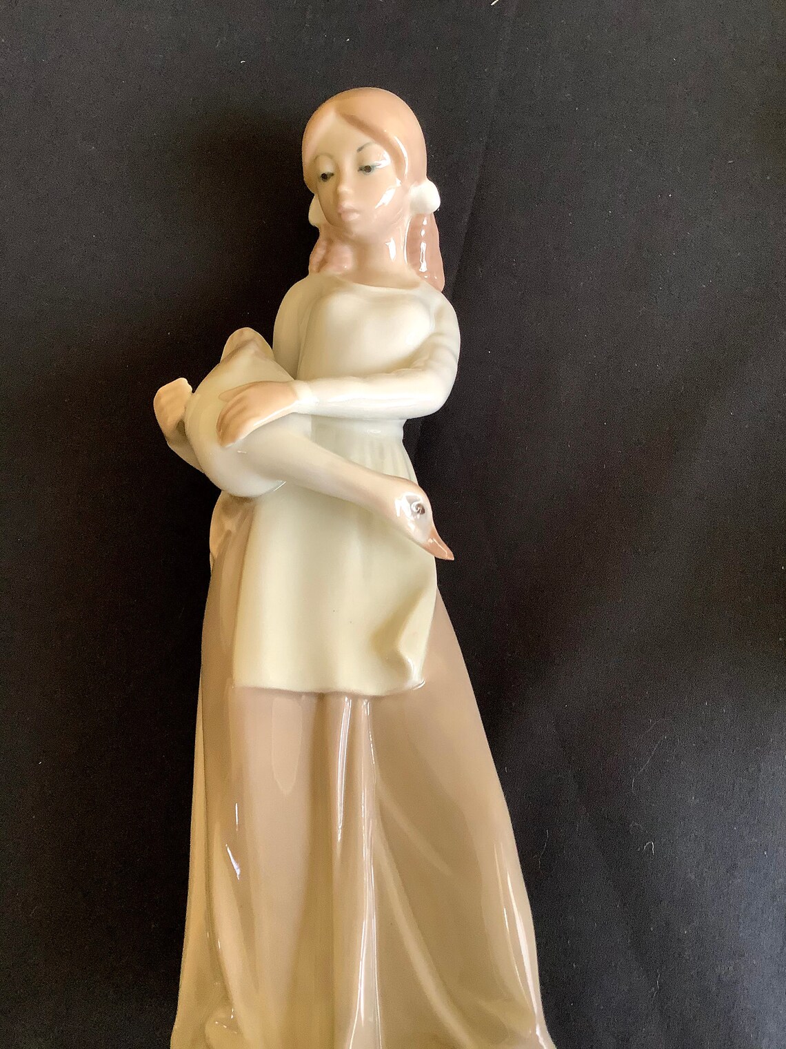 Two Vintage porcelain figurines by Casades Girl holding a Etsy