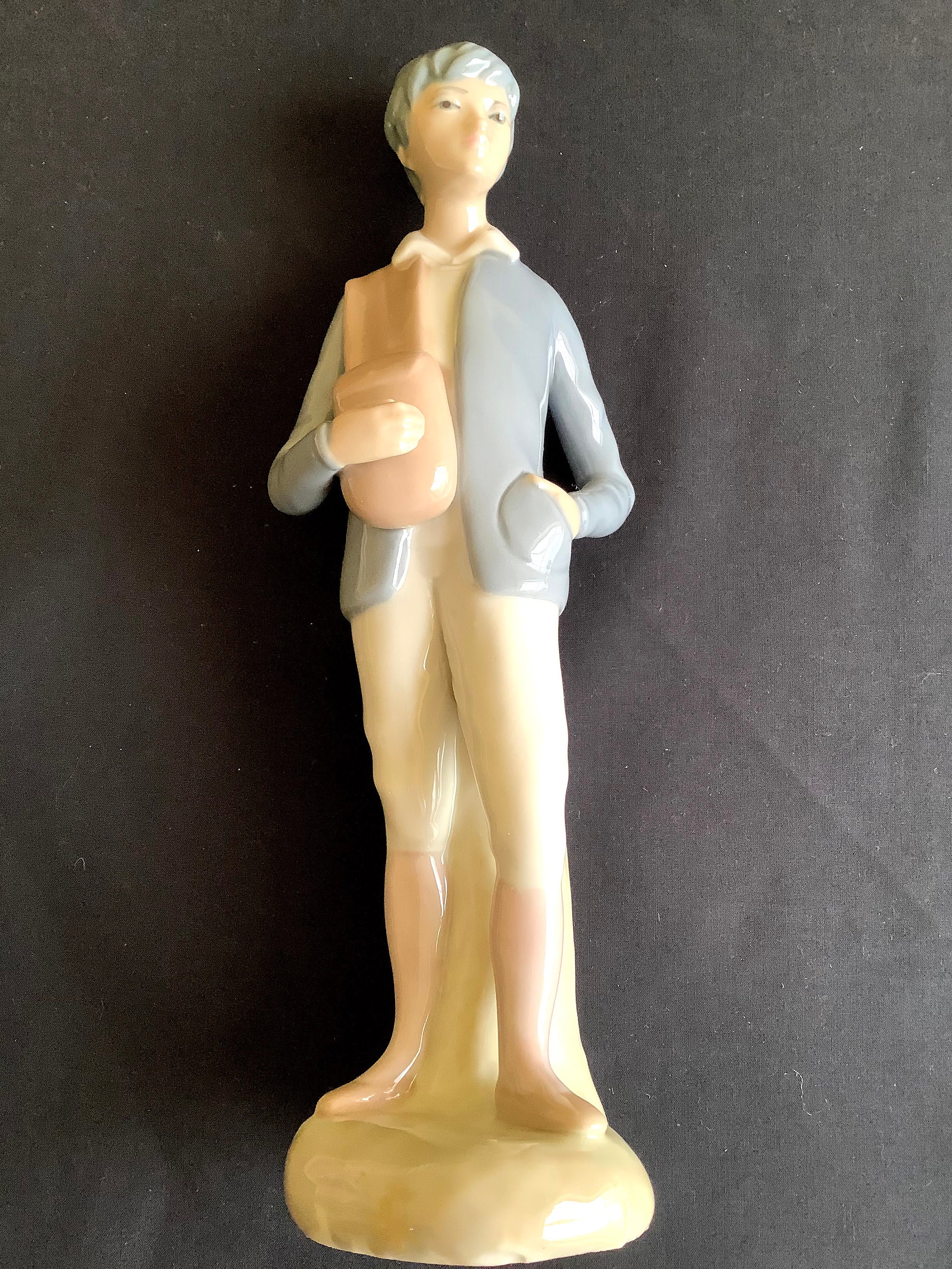 Two Vintage porcelain figurines by Casades Girl holding a Etsy