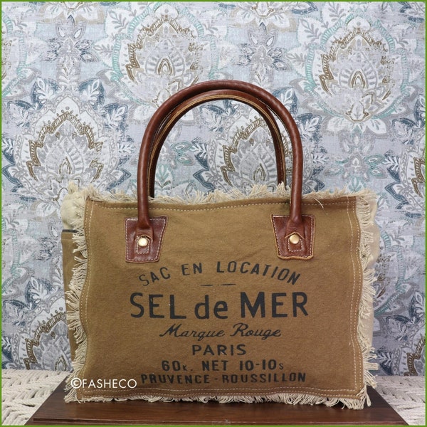 Bolso de mano de lona Monedero Acentos y deshilachados de cuero marrón / Sel De Mer Sac en Location / Accesorio hecho a mano estilo vintage / Myra Bag x FASHECO