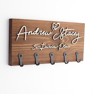 Personalised in Dark Walnut – Couple & Address"
Raised lettering with a rich wood finish