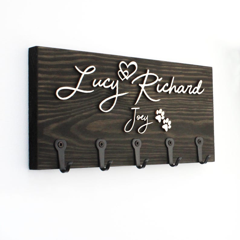 "Personalised Key Holder in Ebony"
"Bold & Modern – Raised Wooden Lettering"
"Add family names or pet paws"