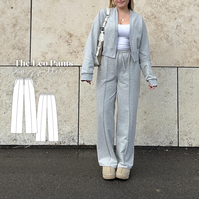 May include: A light gray sweat suit, consisting of a cardigan, a tank top, and wide-leg pants. The pants have a drawstring waist and a seam down the front. The cardigan has buttons. The image also includes a sewing pattern for the pants, with the text "The 1.co Pants sewing pattern."