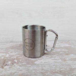 Stainless Steel Camping Mug with Carabiner Handle | NIVEA Men Branded Travel Cup | Rugged Outdoor Coffee Mug