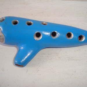 Vintage Ocarina Ceramic blue ocarina Traditional folk wind instrument Antique flute whistle Old clay blue musical instrument