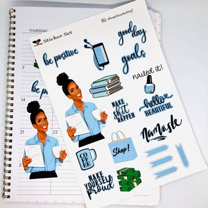 May include: A sticker sheet with a blue and white color scheme featuring motivational quotes, illustrations of a woman, and a coffee cup. The quotes include "be positive", "good day goals", "nailed it!" and "make shit happen".
