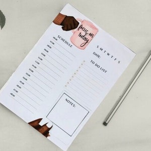 May include: A white daily planner with a pink coffee cup illustration and the text "focus on today". The planner has a schedule section, a to-do list, and a notes section.