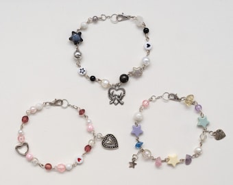 aesthetic beaded bracelets, 3 variations, bracelets with charms, pink black pastel, star charm, heart charm, chain and link