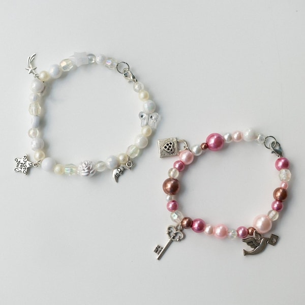 matching beaded bracelets with charms, angel, star, moon, key, pink white