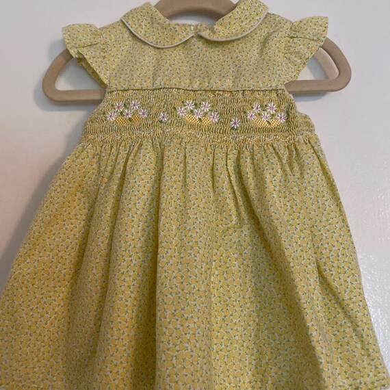 Yellow smocked floral girls dress