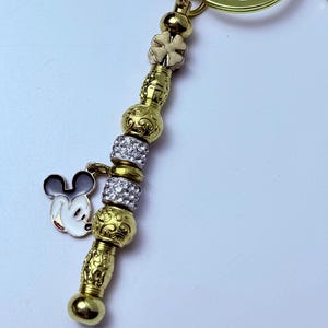 Disney Inspired Gold Bag Charm – Mickey Mouse Keychain with Sparkling Beads & Clover Accent, Handmade Purse Accessory, Disney Gift for Her
