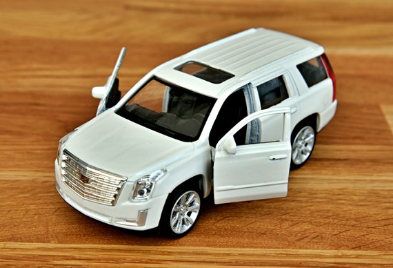 Cadillac escalade toy car deals