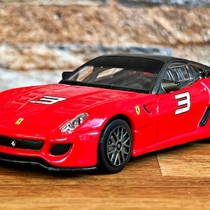 Ferrari 599XX, coche diecast 1/43, coche modelo a escala 1/43, coche vintage 1/43, modelo de coche metal, colección diecast