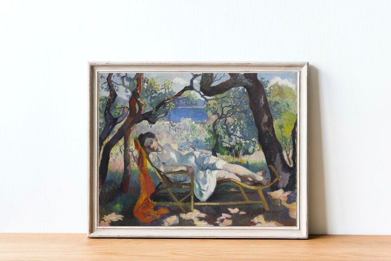 May include: A painting of a woman reclining on a chaise lounge in a garden setting. The woman is wearing a white dress and has her hair pulled back. The garden is lush and green, with trees and flowers. The painting is done in a style reminiscent of Impressionism, with loose brushstrokes and vibrant colors.
