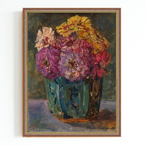 May include: Oil painting of a floral still life. A bouquet of pink, purple, and yellow flowers is arranged in a turquoise vase. The artwork is framed in a brown wooden frame.