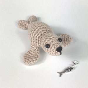 Amigurumi Harp Seal Kit. A full kit with luxury yarns and fittings plus a silver fish stitch-marker. image 1