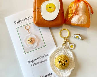 Egg Amigurumi Crochet Keyring Kit / Bag Charm Kit. Contains Egg Keyring Kit, Magnetic Needle Keeper, Stitch Marker & Vegan Leather Pouch.