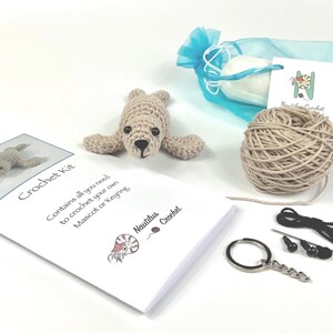 Amigurumi Harp Seal Kit. A full kit with luxury yarns and fittings plus a silver fish stitch-marker. image 2