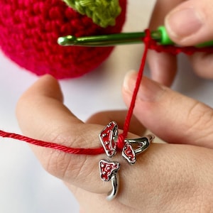Toadstool Mushroom Crochet Ring. 3 adorable Amanita Mushrooms feature in this silver plated, adjustable ring for crochet tension & comfort.