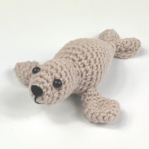 Amigurumi Harp Seal Kit. A full kit with luxury yarns and fittings plus a silver fish stitch-marker. image 3