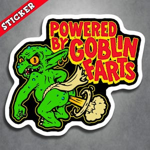 May include: A die-cut sticker featuring a green goblin with yellow eyes and a hoop earring, bent over with a beige cloth around its waist. The text reads POWERED BY GOBLIN FARTS in bold red letters with yellow outlines against a black background.