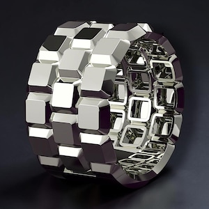 May include: A silver-colored bracelet with a geometric design. The bracelet is composed of numerous square-shaped links, creating a textured, three-dimensional appearance. The links are highly reflective, giving the bracelet a polished look.