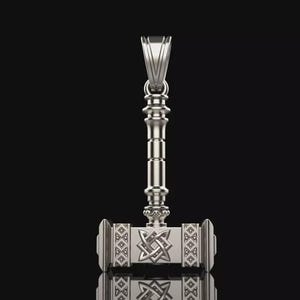 May include: A silver pendant in the shape of Thor's hammer, Mjolnir, with intricate Celtic knot and geometric designs. The pendant has a detailed handle and a loop for a chain. The background is black.