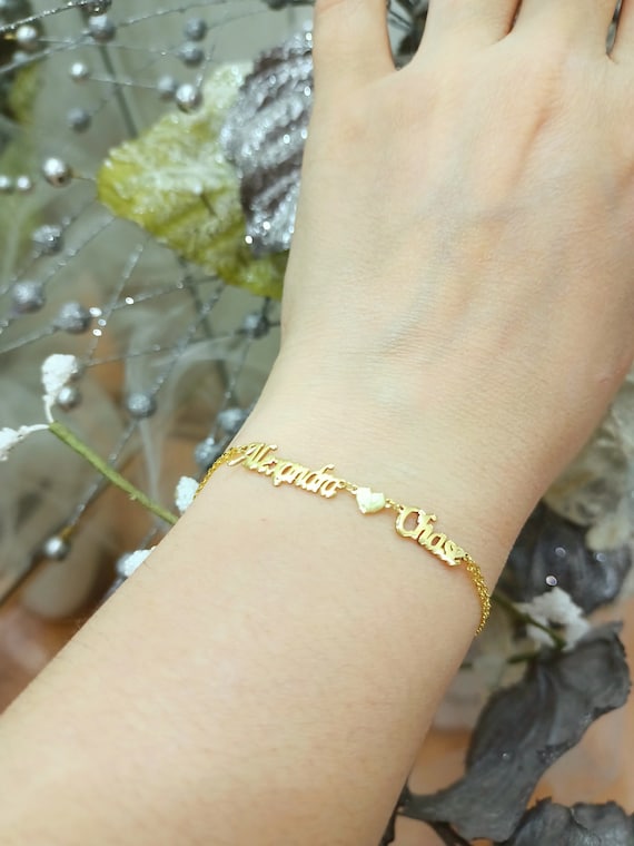 Silver bracelet with two hearts and engraving