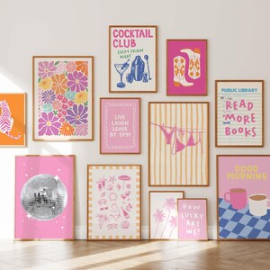 May include: A collection of framed art prints with various designs. The prints include floral patterns, a zebra, a disco ball, and text that reads "COCKTAIL CLUB", "LIVE LAUGH LEAVE BY 9PM", "READ MORE BOOKS", "HOW LUCKY ARE WE?", and "GOOD MORNING".