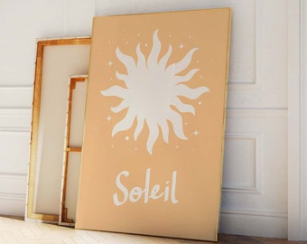 Puede incluir: Un póster de color melocotón con un sol estilizado blanco y la palabra "Soleil" en letra cursiva blanca.