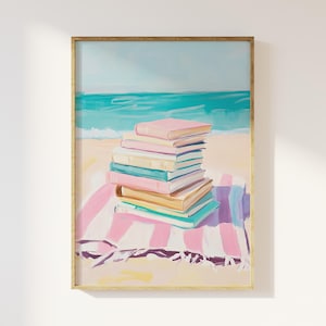 May include: A painting of a stack of colorful books on a pink and white striped beach towel. The books are on a beach with blue ocean waves in the background.