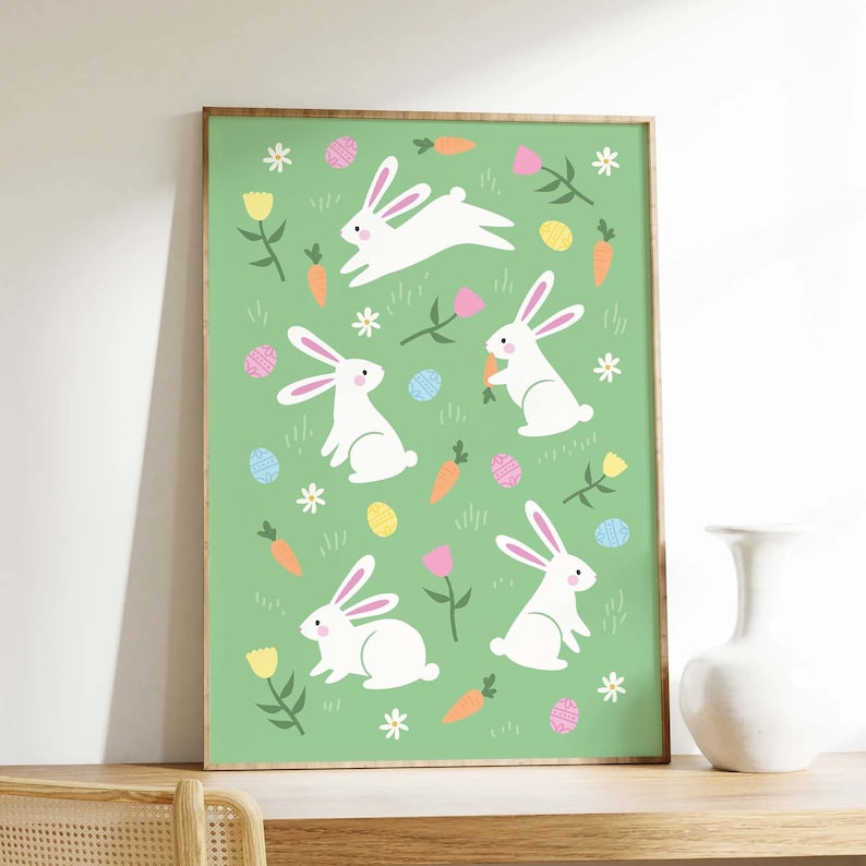 May include: A green background with white bunnies, carrots, and colorful Easter eggs. The bunnies are hopping and holding carrots. This is a digital print for a nursery or child's room.