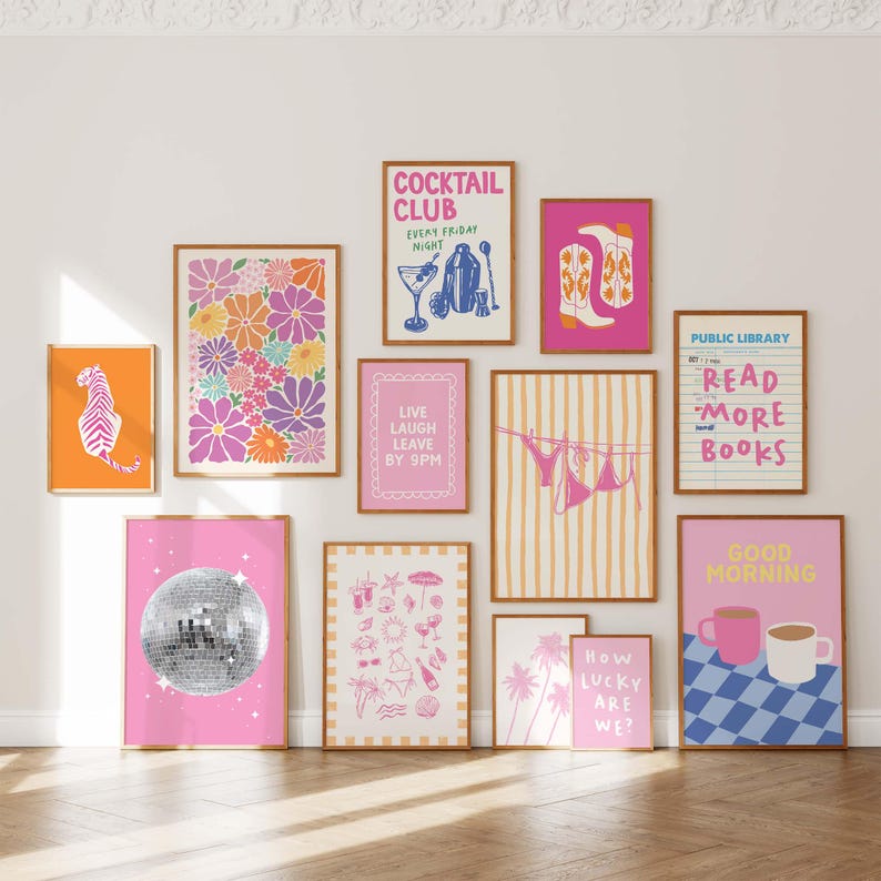 May include: A collection of framed art prints with various designs. The prints include floral patterns, a zebra, a disco ball, and text that reads "COCKTAIL CLUB", "LIVE LAUGH LEAVE BY 9PM", "READ MORE BOOKS", "HOW LUCKY ARE WE?", and "GOOD MORNING".