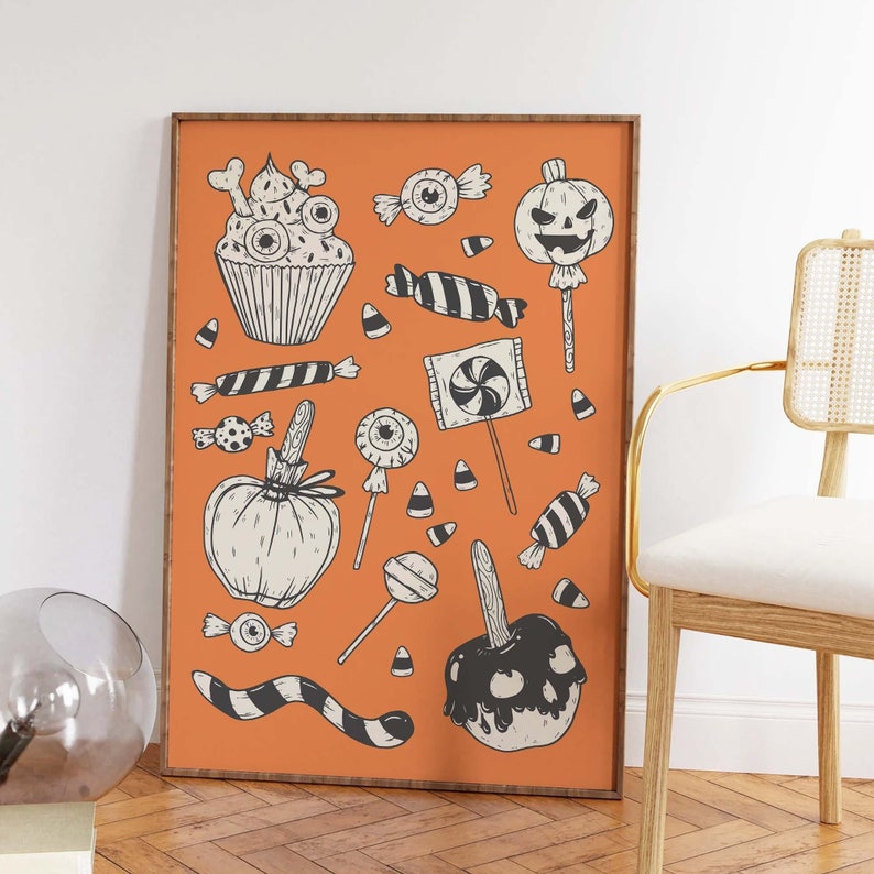 May include: An orange background with black and white illustrations of Halloween treats, including a cupcake with eyes, candy corn, lollipops, a pumpkin, and a candy apple.