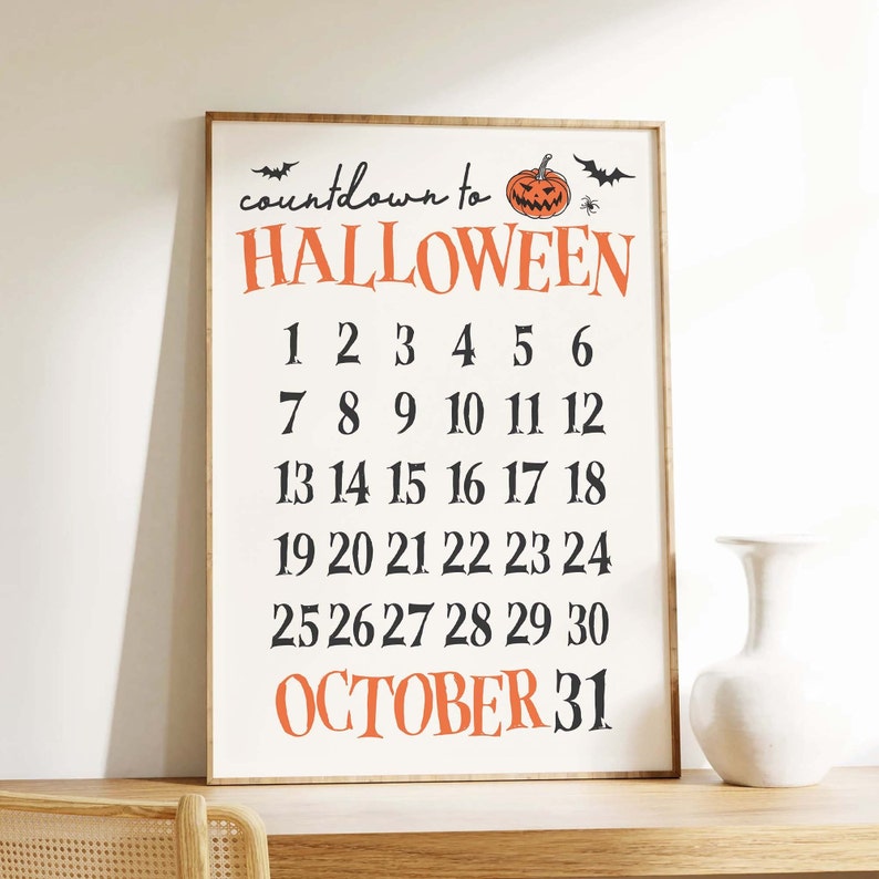 May include: A white printable sign with black text that says "countdown to HALLOWEEN" with a cartoon orange pumpkin and bats. The sign has a countdown of the days of October, with the number 31 highlighted in orange.