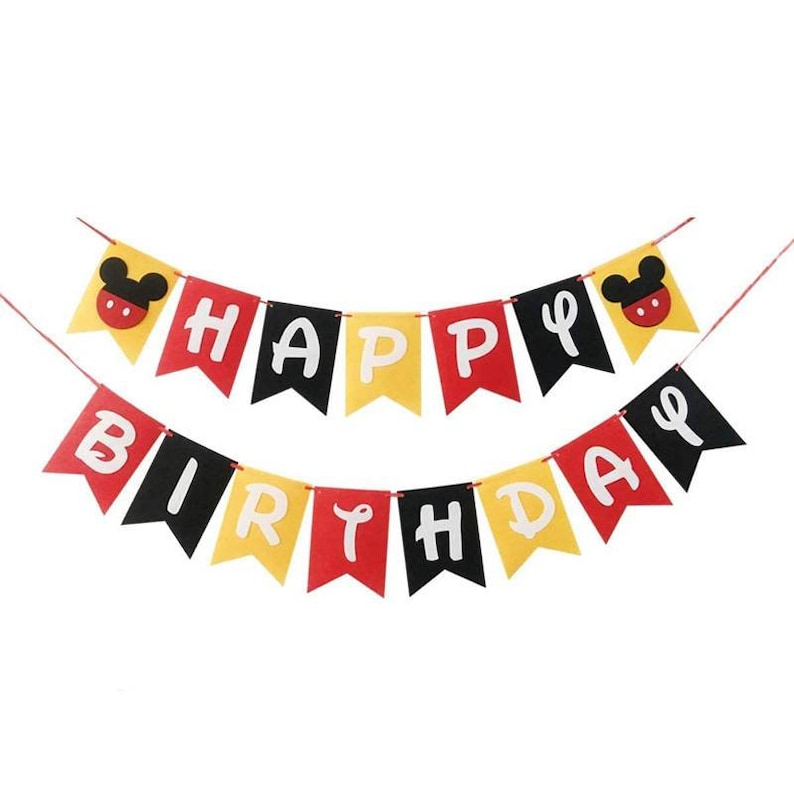 May include: A black, red and yellow felt banner with the words "Happy Birthday" and Mickey Mouse ears on each end.