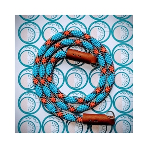 blue and orange rope camera strap with leather finish