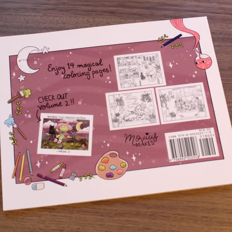 May include: The back cover of a coloring book with a pink background and stars. The title is "Enjoy 14 magical coloring pages!" and there is a smaller image of a frog witch on a cloud. The book is by Movius Makes and has an ISBN number.